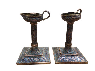 Lot 5036 - Pair of Indian Kashmiri enamelled copper candle lamps, with foliate decoration, 17.5cm high