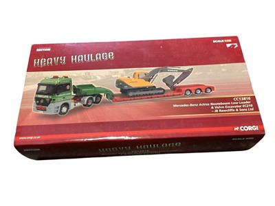 Lot 1836 - Corgi Heavy Haulage 1:50 scale JB Radcliffe & Sons Ltd Mercedes-Benz Actros Nootboom Low Loader, boxed CC13816, Heanor Haulage Volvo F88 2 Axle Loader & Portable Building Load, boxed CC1...
