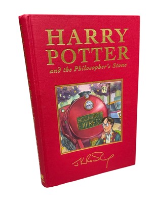 Lot 1315 - J K Rowling - Harry Potter and The Philosopher's Stone, 1999 deluxe edition 8th print, signed by the author