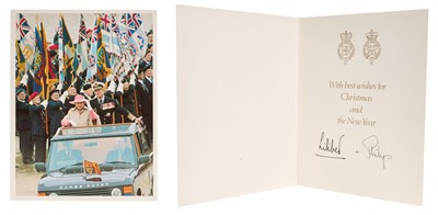 Lot 17 - H.M. Queen Elizabeth II and H.R.H. The Duke of Edinburgh, scarce hand-signed 1994 Christmas card with twin gilt embossed Royal cyphers to the interior, colour photograph of the Royal couple on...