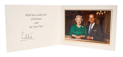 Lot 18 - H.M. Queen Elizabeth II and H.R.H. The Duke of Edinburgh, scarce hand-signed 1997 Christmas card with twin gilt embossed Royal cyphers to cover, colour photograph of the Royal couple to the inte...