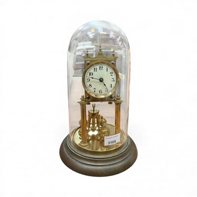 Lot 3105 - Edwardian perpetual motion brass mantle clock under glass dome