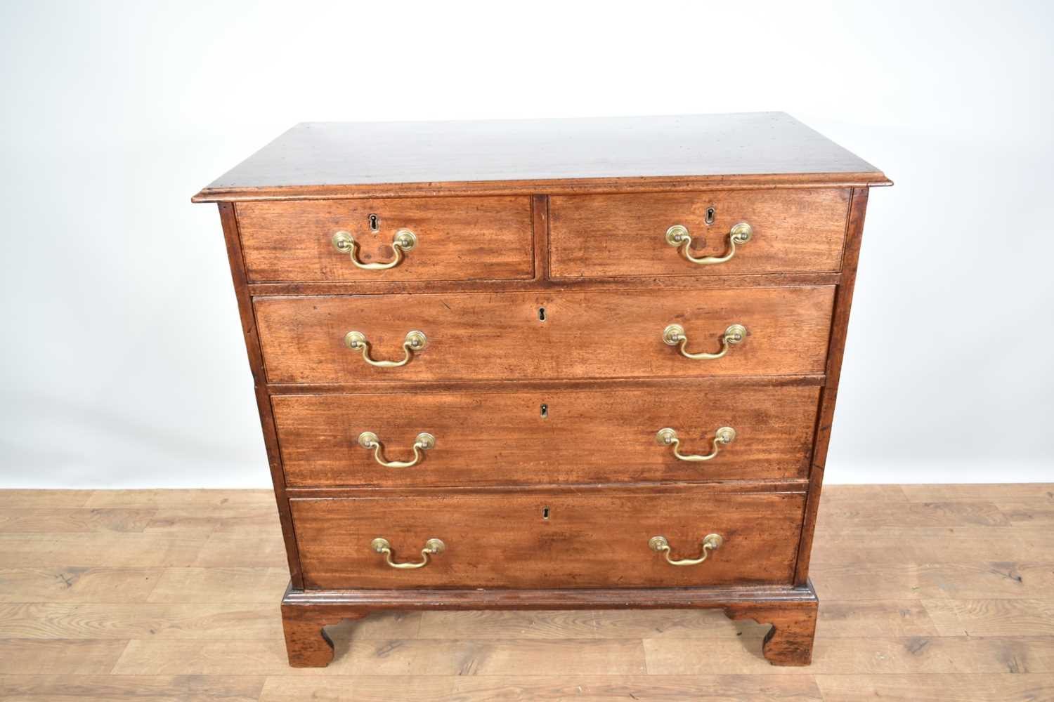 Lot 1214 - George III mahogany chest