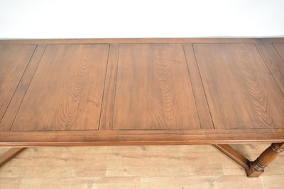 Lot 1210 - Good quality 18th century style draw-leaf refectory table and en-suite set of fourteen chairs by Stewart Linford