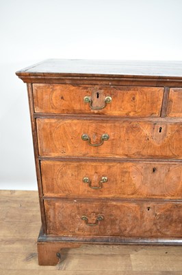 Lot 1242 - Early 18th century walnut feather banded chest