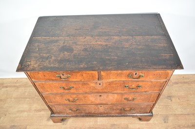 Lot 1242 - Early 18th century walnut feather banded chest