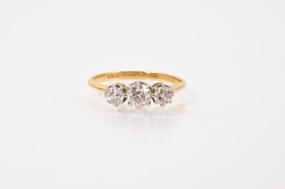 Lot 641 - Diamond three stone ring on 18ct gold shank