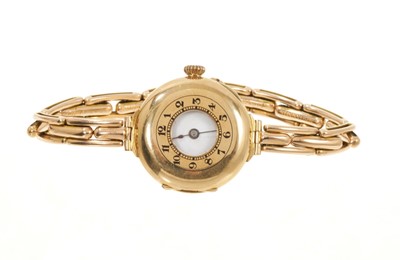 Lot 788 - Ladies' antique 15ct gold half hunter wristwatch, in a leather case