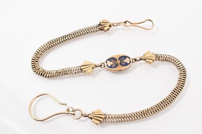 Lot 738 - Yellow metal two strand watch chain with a central blue enamelled oval disc, 34.5cm