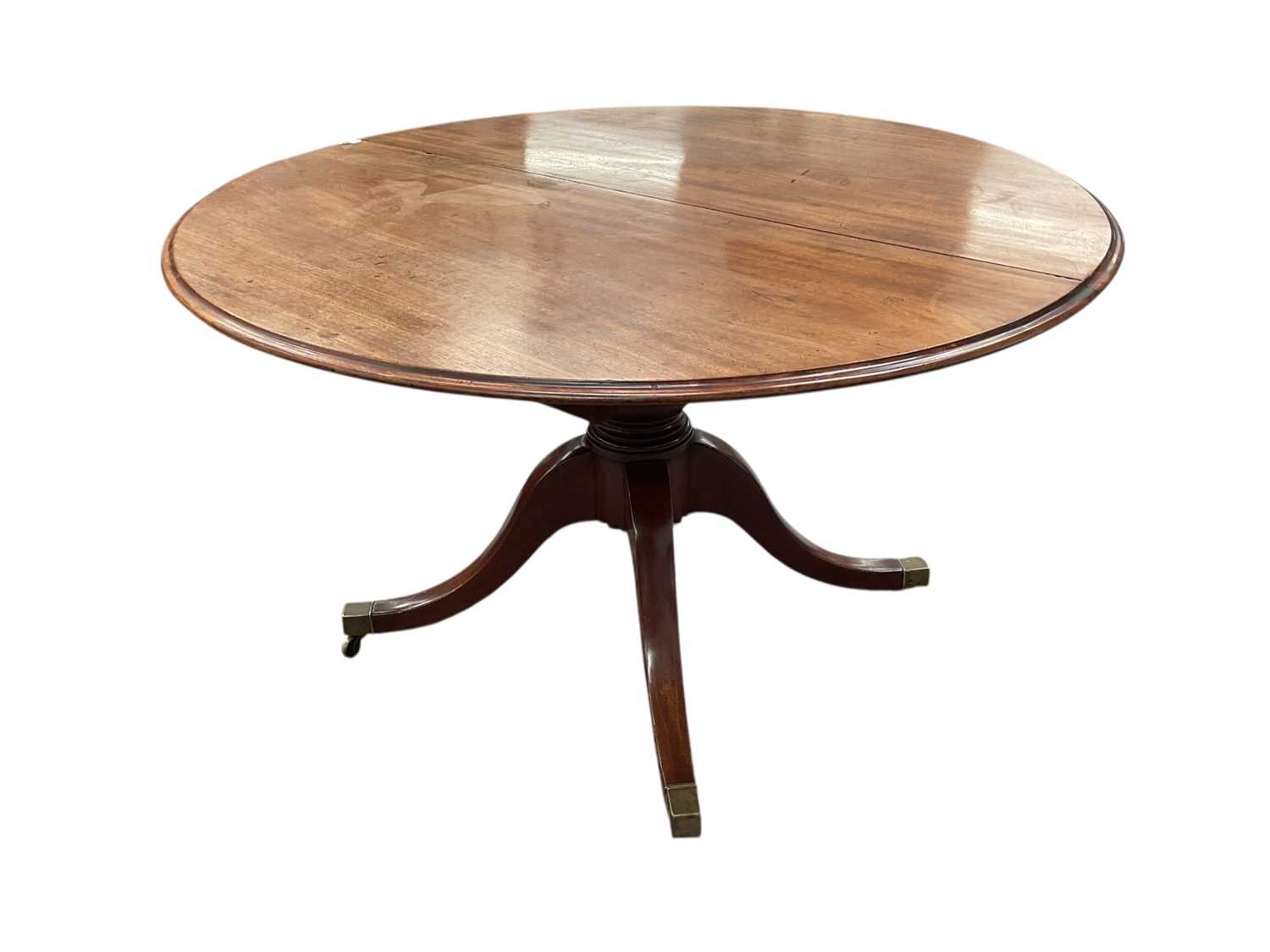 Lot 1255 - Unusual George IV mahogany pedestal extending dining table