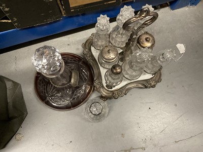 Lot 5193 - Victorian silver plated cruet stand with glass and silver lidded jars, together with a silver mounted decanter and a port decanter with silver wine label