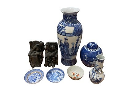 Lot 5083 - A mixed group of ceramics to include a 19th century Chinese blue and white bottle vase, a prunus vase etc, together with two modern bookends