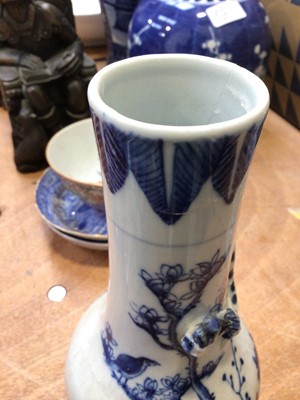 Lot 5083 - A mixed group of ceramics to include a 19th century Chinese blue and white bottle vase, a prunus vase etc, together with two modern bookends