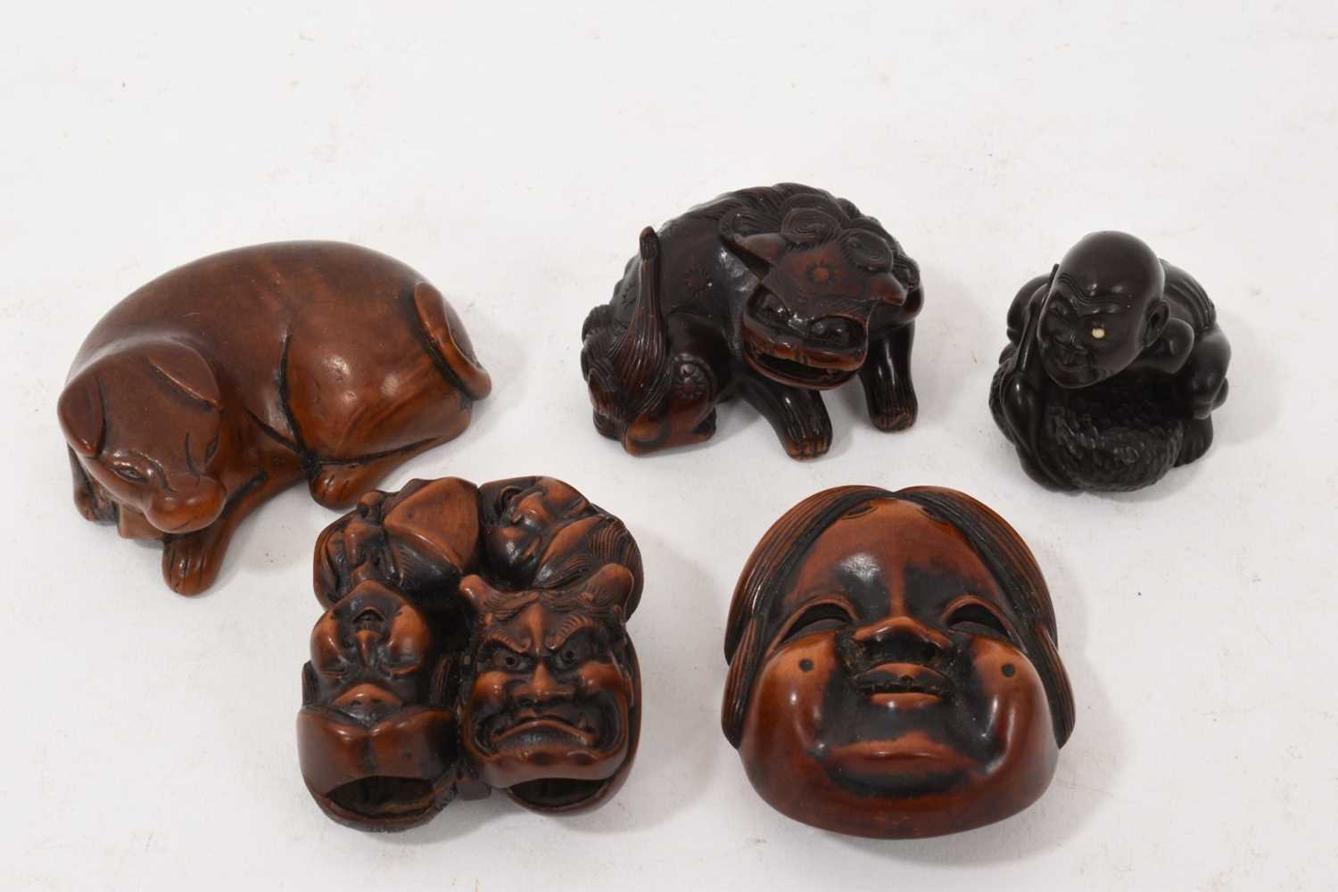 Lot 845 - Japanese carved boxwood netsuke, in the form