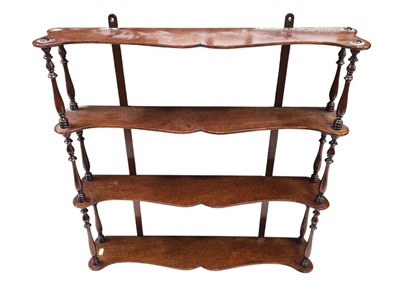 Lot 5315 - 19th century style mahogany hanging shelves with four shaped shelves and turned supports