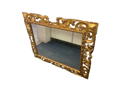 Lot 1245 - 19th century Neapolitan style pierced giltwood wall mirror, with rectangular glass, 85 x 98cm