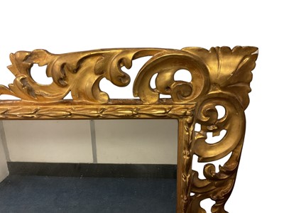 Lot 1245 - 19th century Neapolitan style pierced giltwood wall mirror, with rectangular glass, 85 x 98cm