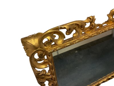 Lot 1245 - 19th century Neapolitan style pierced giltwood wall mirror, with rectangular glass, 85 x 98cm