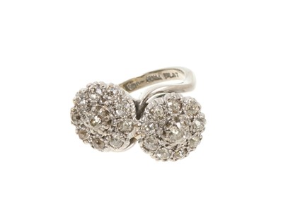 Lot 605 - Diamond double cluster crossover ring with two flower head clusters of old cut diamonds in platinum setting on 18ct white gold shank, estimated total diamond weight approximately 1.75cts. Ring s...