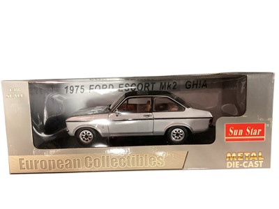 Lot 1863 - Sun Star 1:18 scale 1975 Ford Escort MkII Ghia Platinum coachwork & Vinyl roof, in window box 4623R and Minichamps 1971 Ford Escort Street, boxed (2)