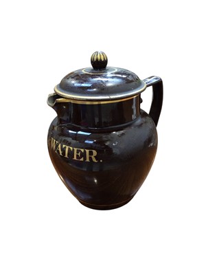 Lot 5160 - 19th century brown glazed pearl ware 'Toast & Water' jug and cover