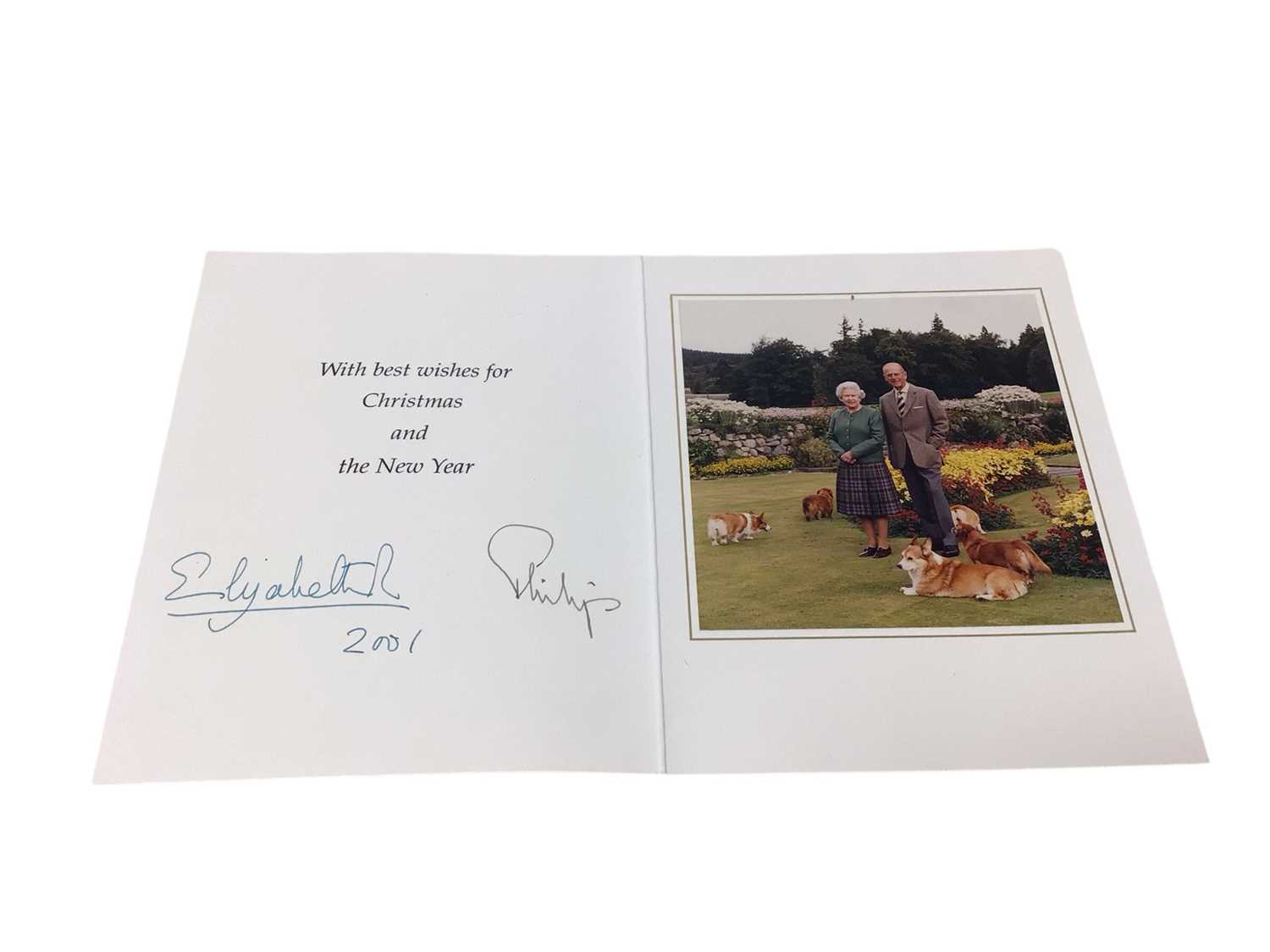 Lot 83 - H.M. Queen Elizabeth II & H.R.H. The Duke of Edinburgh, signed 2001 Christmas card with colour photograph to the interior of the Queen and Duke with their Corgis. Provenance: sent to Major Si...