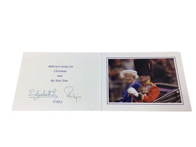 Lot 84 - H.M. Queen Elizabeth II & H.R.H. The Duke of Edinburgh, signed 2003 Christmas card with colour photograph to the interior of the Queen and Duke riding in an open carriage. Provenance: sent to...