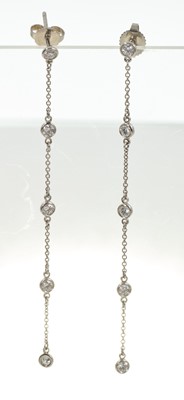 Lot 690 - Tiffany 'Diamonds by the yard' pendant earrings