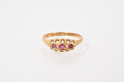 Lot 710 - Antique ruby and diamond ring with three mixed-cut rubies and two rose cut diamonds in 18ct gold setting, Birmingham 1919, ring size Q½.