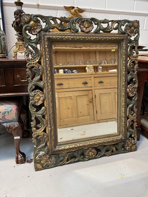 Lot 5295 - Large bevelled wall mirror in gilded and painted shell and foliate scroll frame