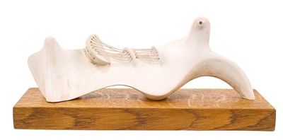 Lot 1199 - Manner of Henry Moore (1898-1986) plaster macquette - reclining form, 25cm long, raised on oak plinth, with typed label to underside: 'Stringed Reclining Figure, 1939, Archive 0036302