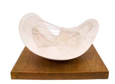 Lot 1198 - Manner of Henry Moore (1898-1986) plaster macquette - stringed form, 28cm long, raised on oak plinth, with typed label to underside 'Stringed Figure, 1938, Archive 0032692