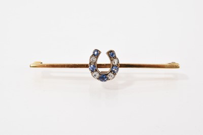 Lot 743 - Antique sapphire and diamond horseshoe brooch on a later 9ct gold bar brooch fitting.
