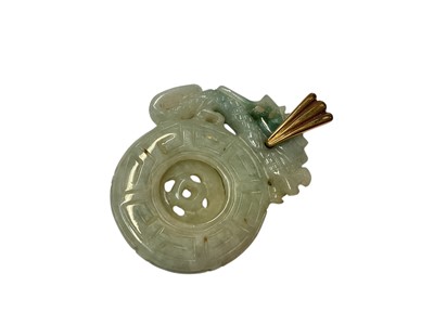 Lot 212 - Chinese carved jade/green hardstone pendant with 9ct gold mount, 59mm