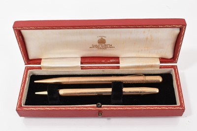 Lot 744 - Two 9ct gold propelling pencils, one hallmarked London 1954 and the other 1972 (2)