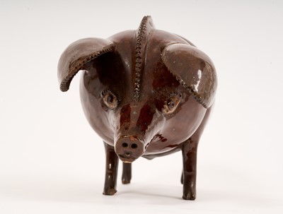 Lot 317 - Treacle glazed pottery pig