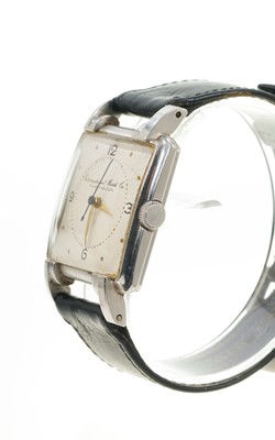 Lot 772 - Art Deco IWC wristwatch, with manual-wind movement, the square dial with Arabic and gold dot hour markers, gold hands and blued steel centre seconds, signed International Watch Co. Schaffhausen, in...