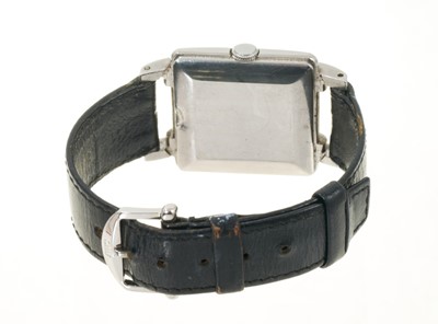 Lot 772 - Art Deco IWC wristwatch, with manual-wind movement, the square dial with Arabic and gold dot hour markers, gold hands and blued steel centre seconds, signed International Watch Co. Schaffhausen, in...