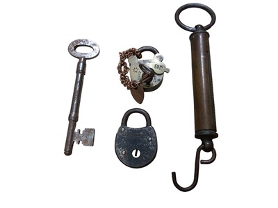 Lot 2916 - Victorian brass padlock and key with cipher and patent mark, together with another padlock, a set of spring scales, and another key