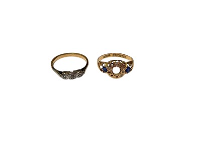 Lot 116 - 18ct gold gem set ring (stones missing) together with a diamond three stone ring (2)