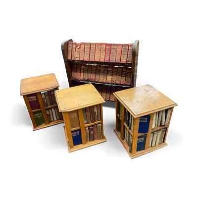 Lot 1437 - Three miniature bookcases housing Shakespeare sets.