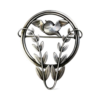 Lot 30 - Georg Jensen Danish sterling silver bird brooch with a circular border and foliate decoration, designed by Arno Malinowski, no. 258