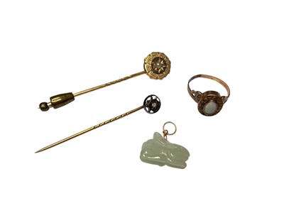 Lot 210 - Gold (333) opal ring, two Victorian stick pins and a small green hardstone rabbit pendant (4)