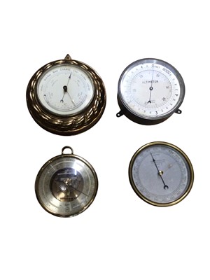 Lot 2948 - Late Victorian metal cased aneroid barometer / thermometer with rope twist design, together with two other aneroid barometers and an altimeter (4)