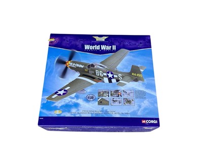 Lot 1914 - Corgi The Aviation Archive 1:32 scale P-51D-10-NA Mustang "Old Crow", with box AA34402 (x2) and P-51D-20-NA Mustang "Big Beautiful Doll", with box AA34403 (Previously Displayed contents incomple...