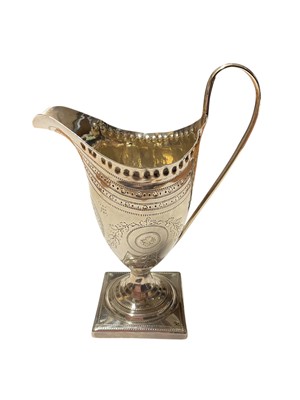 Lot 171 - George III silver cream jug of helmet form with bright cut engraved decoration, (London 1796), maker Peter & Ann Bateman, 14cm in overall height, all at 2.5ozs.