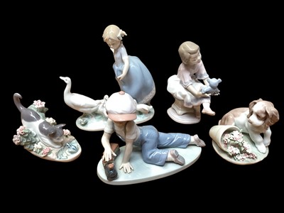 Lot 2219 - Five Lladro porcelain figures including All Aboard and Best Friend