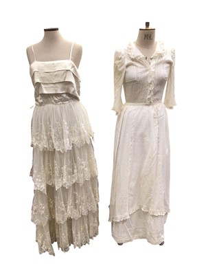 Lot 2542 - Small group of vintage women's clothing including 1930s black crepe beaded evening dress, frilly cream crepe and satin tie front bolero, tiered lace shoe-string strep evening dress, 1970's white...