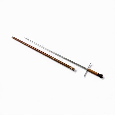 Lot 842 - Late 19th century French sword stick with Toledo steel blade signed O Adam & Cie Paris (masked A over double duck), with quarter opening and a hand guard that springs up when he bl...