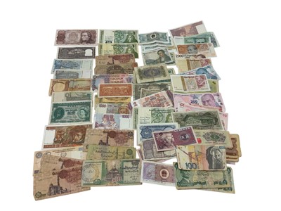 Lot 422 - World - Mixed banknotes taken from circulation x 379, UK Food Coupons circa 1950 x 32 and British Postal Orders x 3 (Total items 414)